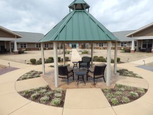 An outdoor area in a skilled nursing facility the crossing